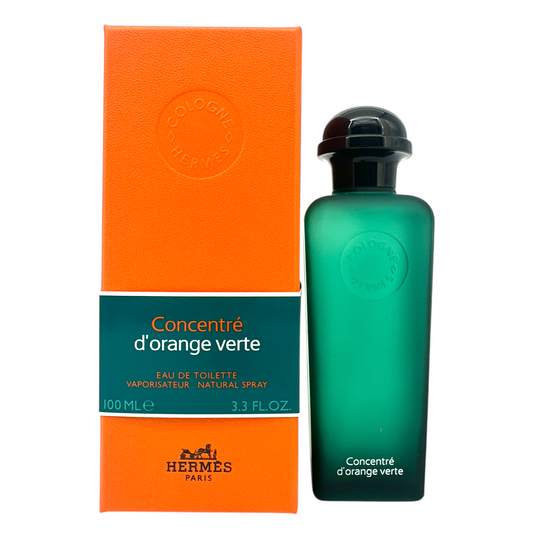Hermes Concentre D'Orange Verte Eau De Toilette 100ml bottle, featuring a sleek green glass design with a black cap, representing a fresh citrus fragrance for men and women, available at Zakura Global.