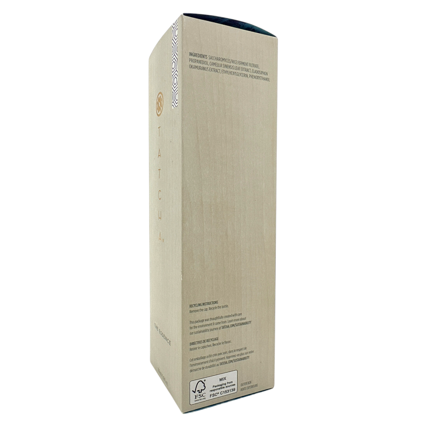 A tall, slim bottle of Tatcha The Essence Plumping Skin Softener with a beige label and a small decorative pattern on the lower right corner.