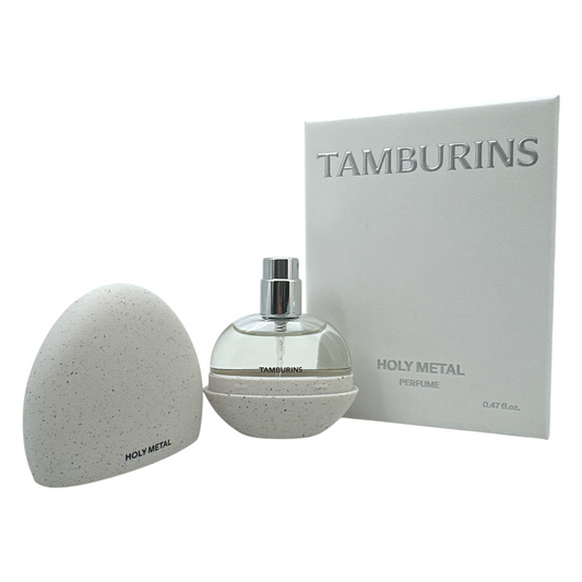 Tamburins Egg Perfume – Holy Metal 14ml, luxury solid fragrance with woody and metallic notes in sculptural egg-shaped packaging, available at Zakura Global.